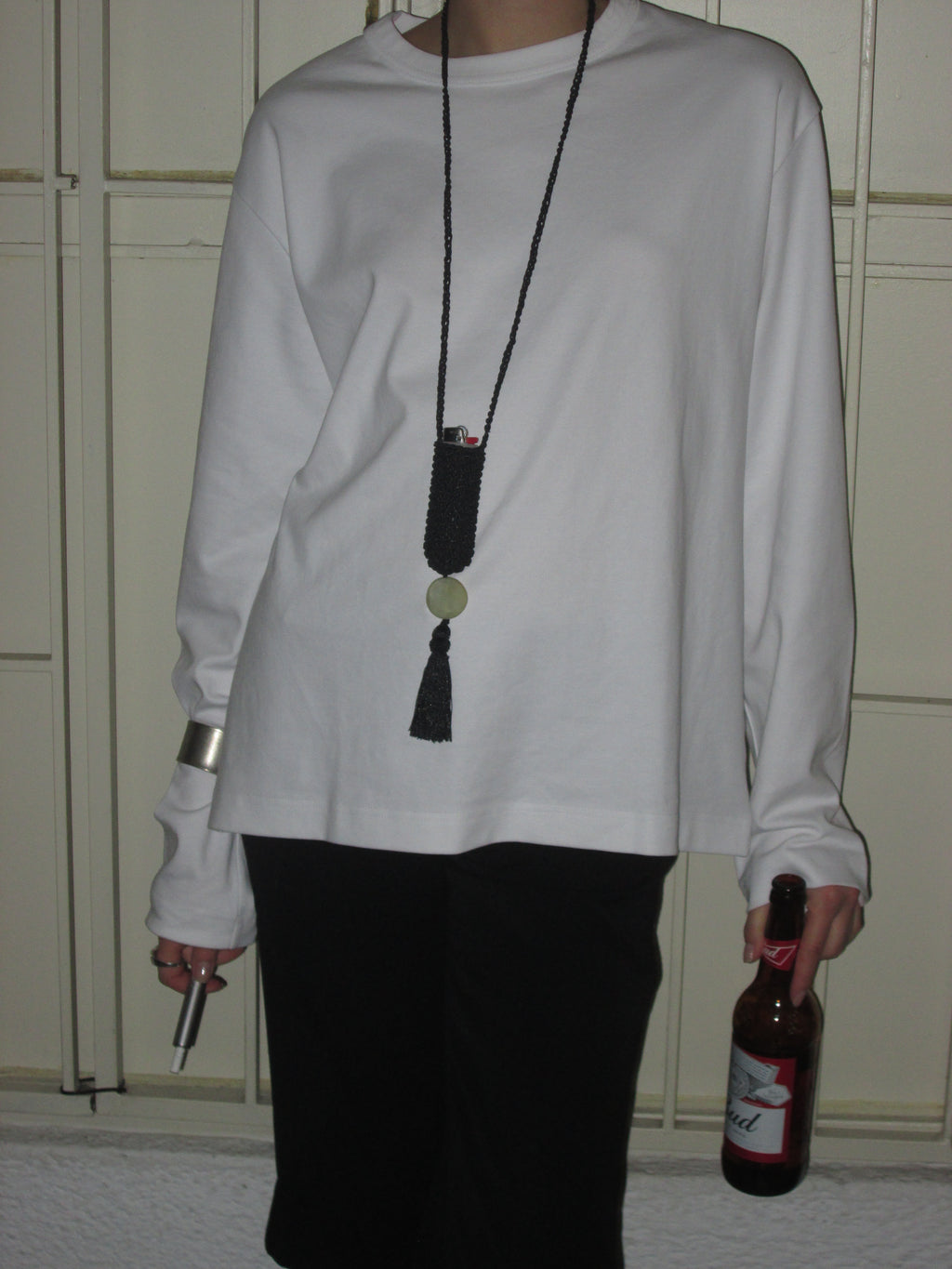 Slim Tassel Pouch in Black