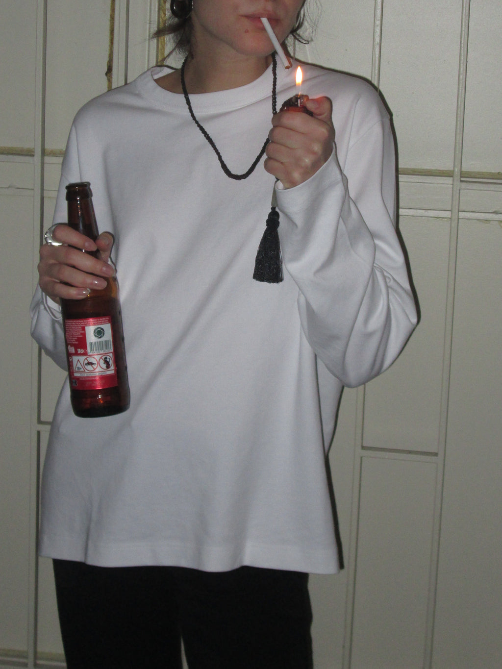 Slim Tassel Pouch in Black