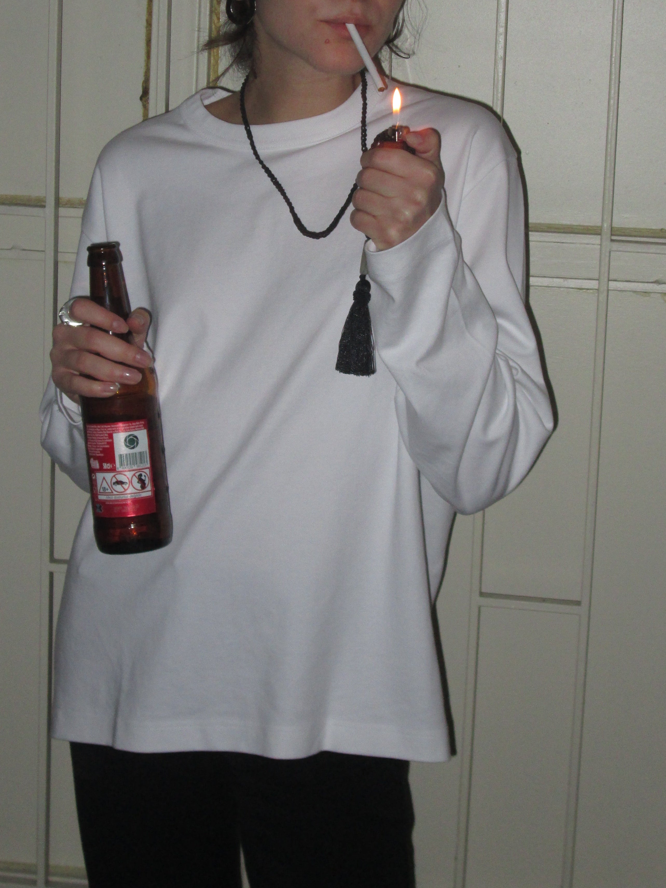 Slim Tassel Pouch in Black