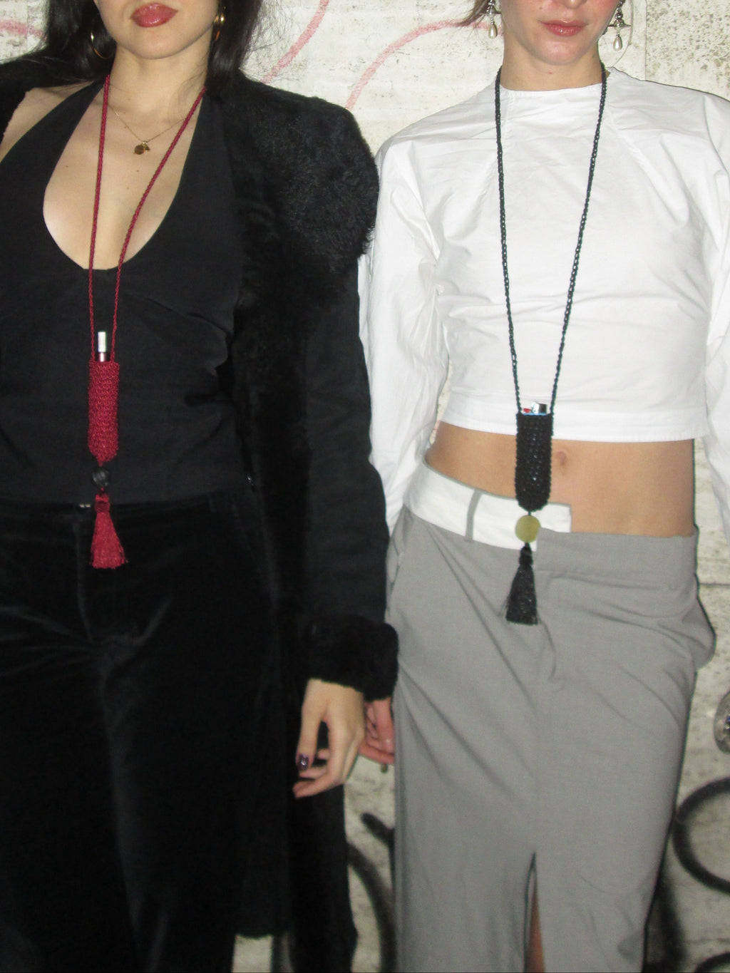 Slim Tassel Pouch in Black